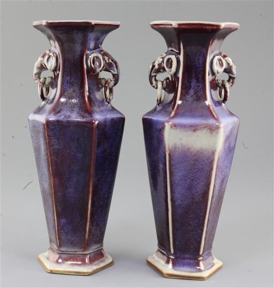 A pair of Chinese flambe glazed hexagonal baluster vases,
